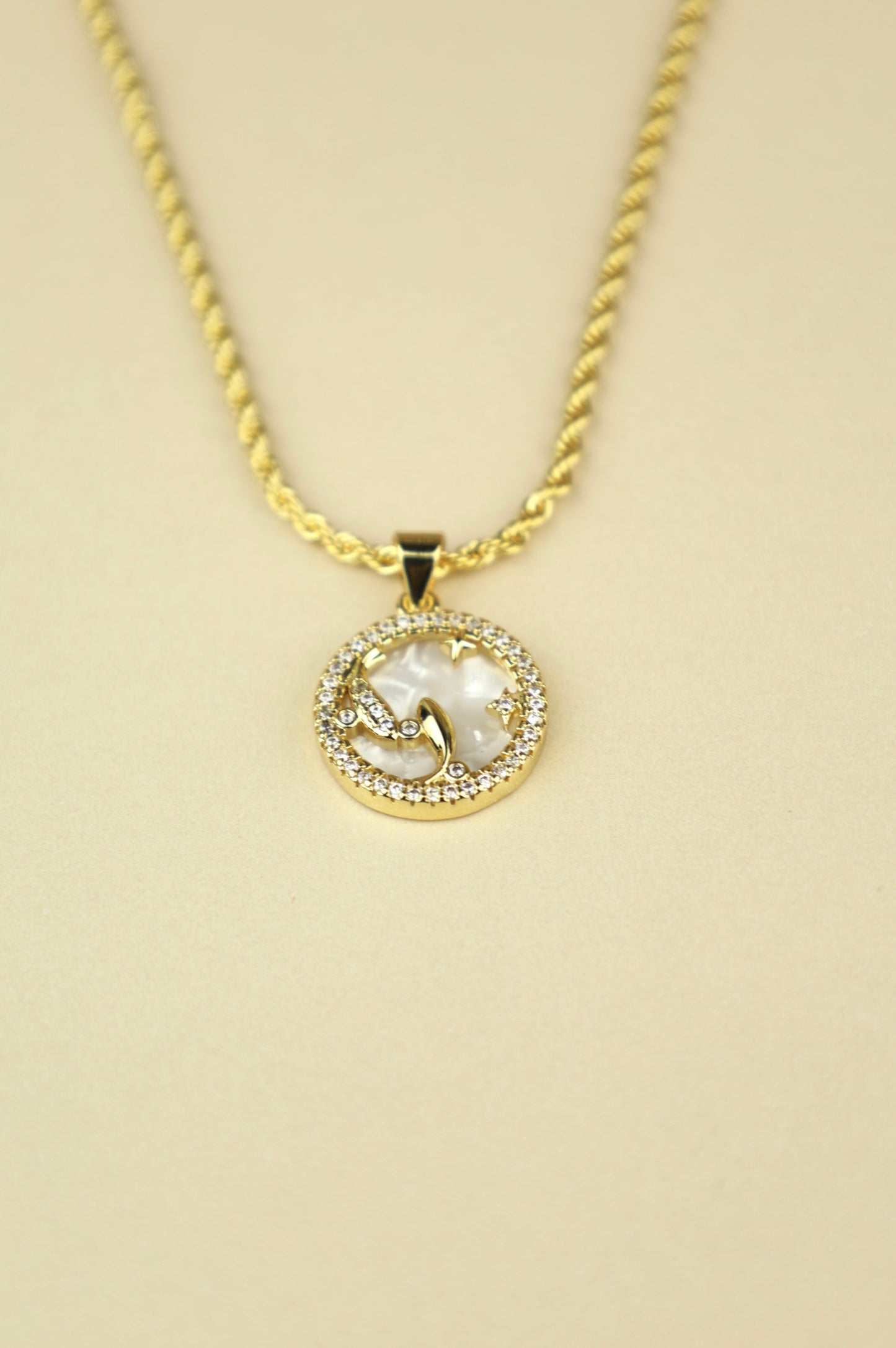 Aquarius zodiac necklace in gold