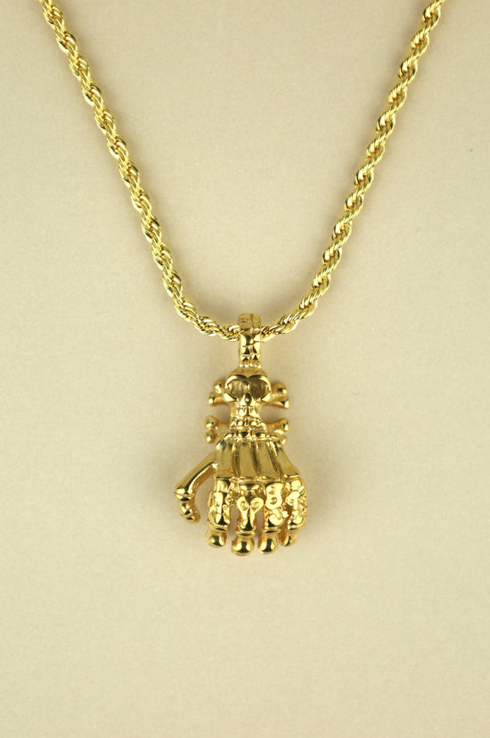 Skeleton Hand necklace in gold