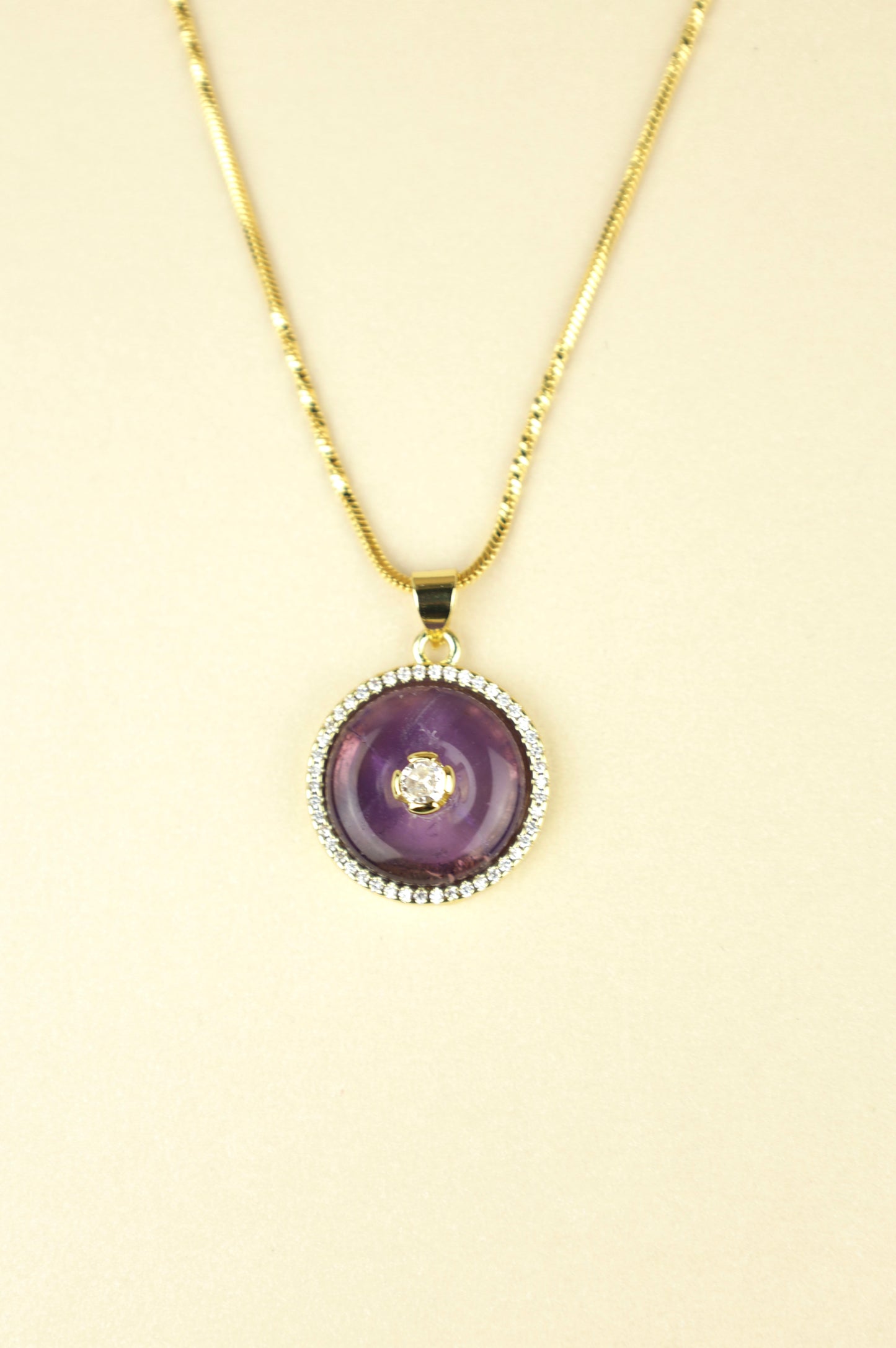 Infinity Amethyst necklace in gold