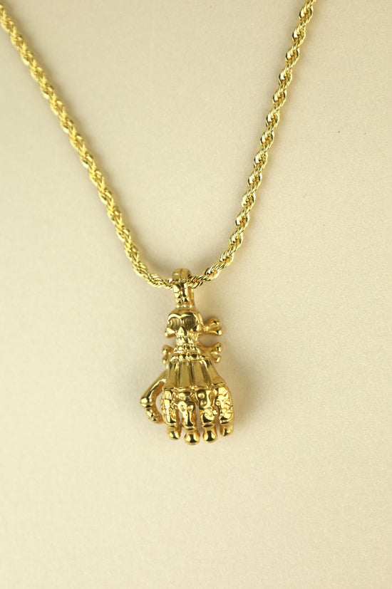 Skeleton Hand necklace in gold