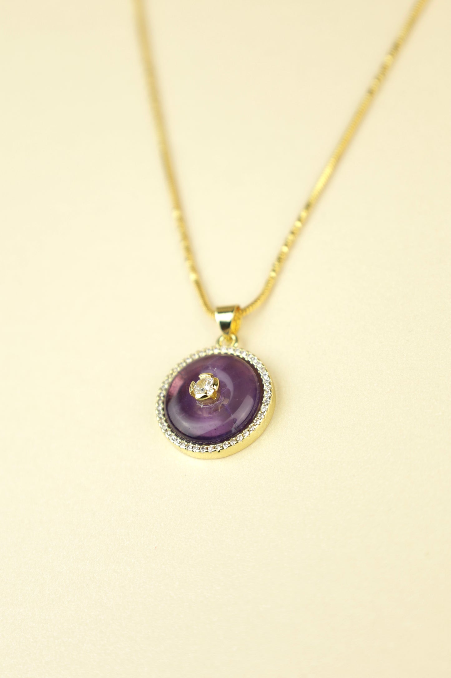 Infinity Amethyst necklace in gold