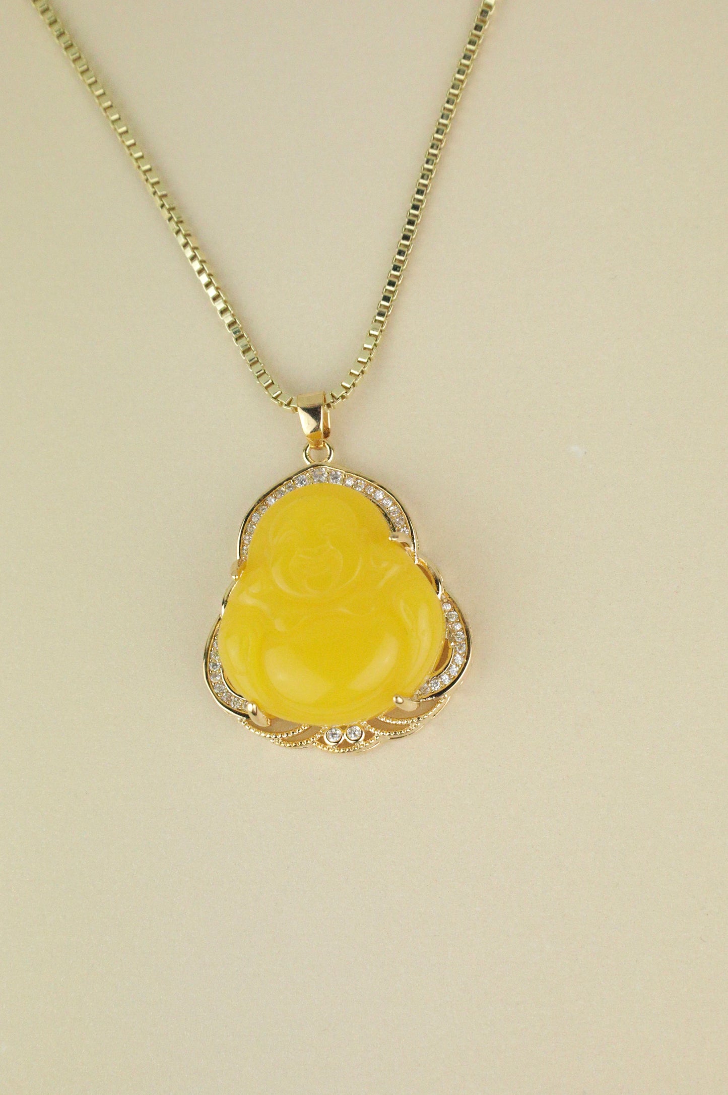 Load image into Gallery viewer, Yellow Buddha necklace in gold
