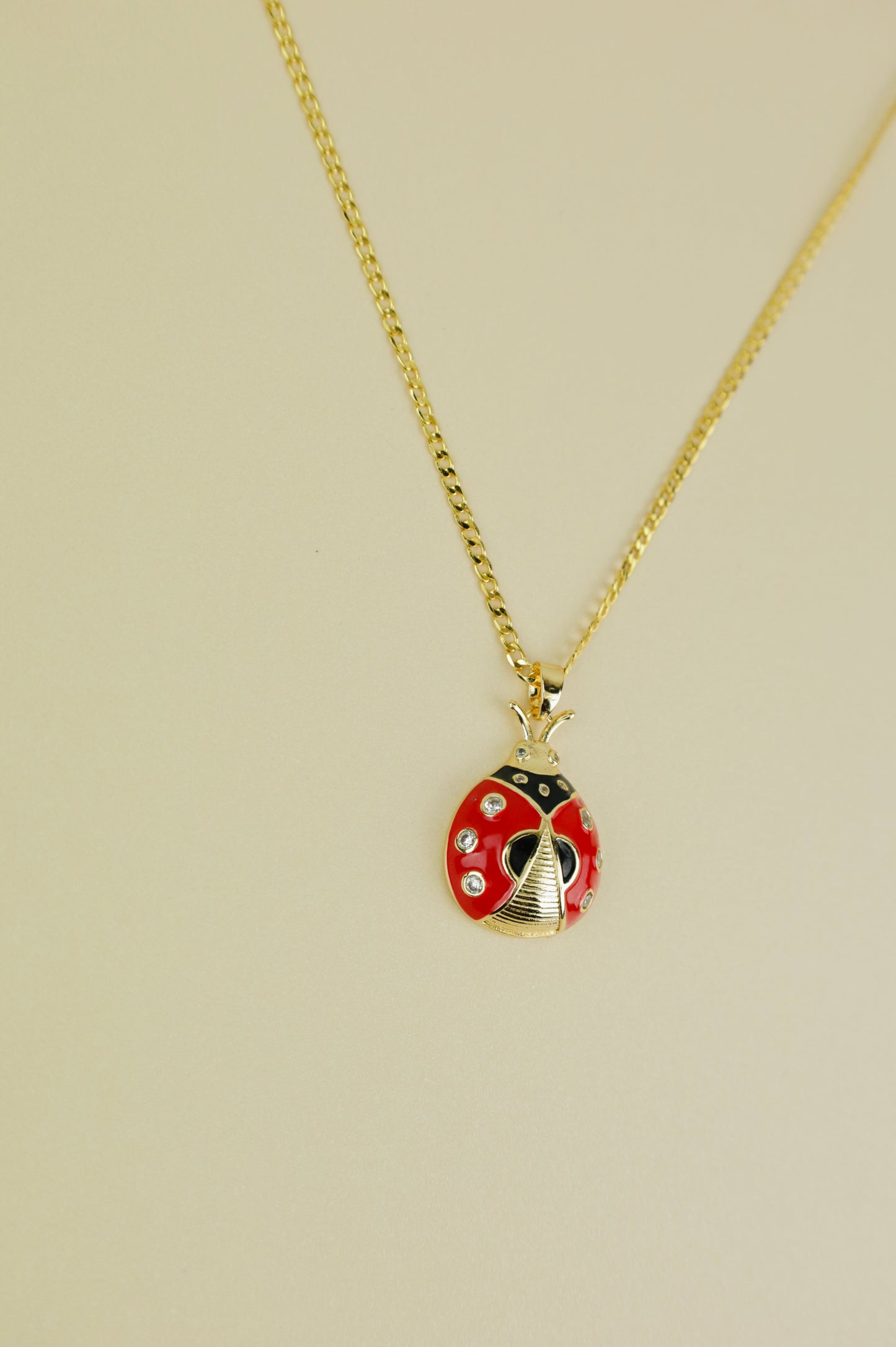 Ladybug Necklace in gold